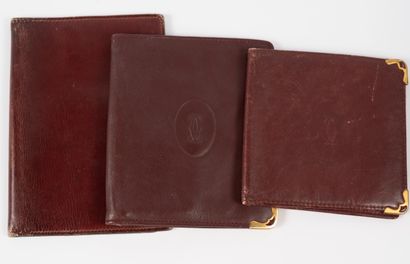 null CARTIER and HERMES Lot 
- Billfold,
- Notebook case,
- Bordeaux box leather...