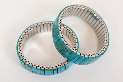 null Two metal bracelets and turquoise plaques.