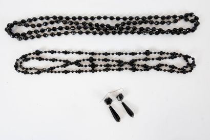 null Lot comprising two long faceted black pearl necklaces and a pair of matching...