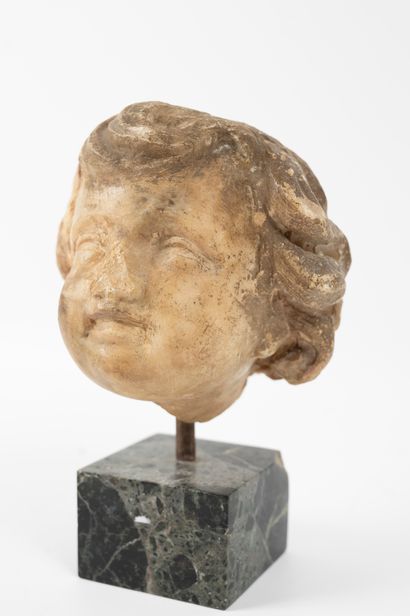 null Carved marble cherub head
(Accents and restorations)
Height: 12 cm. Resting...