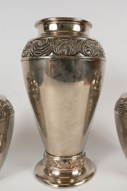 null Set of three silver-plated baluster-shaped vases decorated on the shoulder with...