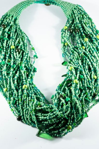 null ABACUS original 
Long necklace with multiple strands of green pearls. 
Length:...