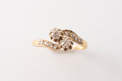 null Vous Moi ring in 18k yellow and white gold topped with brilliant-cut diamonds....