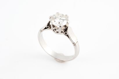 null Solitaire ring in 18k white gold set with a 1.43ct half-cut diamond. Color J,...