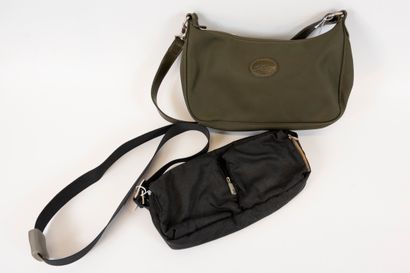 null Lot including two bags:
- LONGCHAMP A small forest-green canvas bag with shoulder...