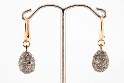 null POMELLATO Paris
Pair of silver and 18k yellow gold earrings holding a drop entirely...