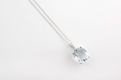 null Pendant featuring a 3.90cts oval-cut aquamarine topped with 4 diamonds on the...