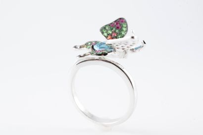 null Butterfly ring in 18k white gold, centered on a pear-shaped aquamarine. Wings...