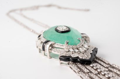 null Superb necklace in 18k white gold holding as a pendant a pear-cut emerald weighing...