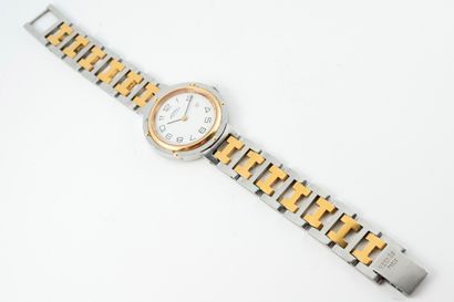 null HERMES 
Clipper" model
Two-tone steel watch, oval case, white dial, date window...
