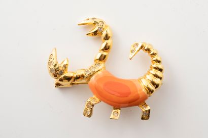 null PIERRE CARDIN
Circa 1970
Two metal brooches representing the zodiac signs Taurus...