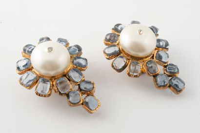 null CHANEL by GRIPOIX 
Magnificent pair of gilded metal earrings embellished with...
