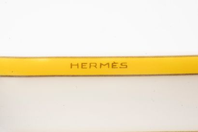 null HERMES, Paris
Soleil d'Hermès
White porcelain tray with yellow graphic design.
16x12cm.
Brand...