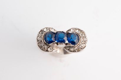 null Tank ring in 18k white gold set with blue and white stones. 
Unreadable hallmark....