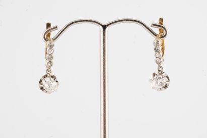 null 18k yellow and white gold sleeper earrings set with old-cut diamonds surrounded...