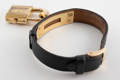 null HERMES Paris
Model "KELLY
Ladies' wristwatch, black leather strap, gold dial,...