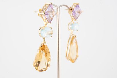 null A pair of vermeil earrings, featuring a diamond-shaped amethyst holding a blue...