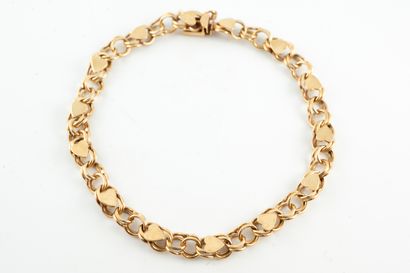 null 14k yellow gold bracelet with interlaced round links embellished with heart...