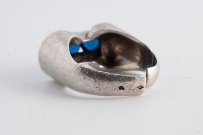 null Tank ring in 18k white gold set with blue and white stones. 
Unreadable hallmark....