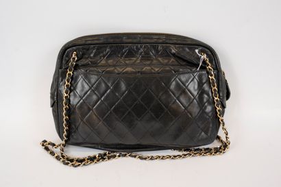 null CHANEL Paris
Quilted black leather bag with two handles in interwoven leather...