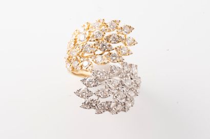 null Foliage ring in 18k yellow and white gold set in a Vous Moi shape and entirely...