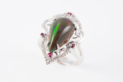 null 18k white gold ring set with a beautiful black drop opal on a diamond and ruby...