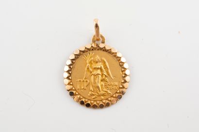 null Medal in 18k yellow gold representing the astrological sign of Virgo. 
Weight...