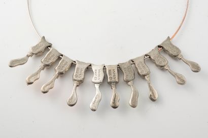 null ARMAN (1928-2005)
Circa 2001
Rare "tube" necklace featuring 10 tubes of multicolored...