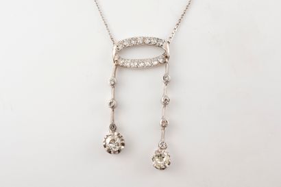 null Negligee necklace in 18k white gold consisting of a diamond-set ring holding...