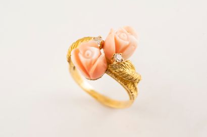 null 18k yellow gold ring featuring two angel-skin coral flowers set with two diamonds,...