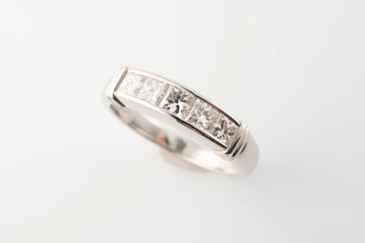 null Platinum ring set with 5 princess-cut diamonds in a closed setting, weighing...