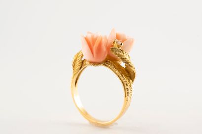 null 18k yellow gold ring featuring two angel-skin coral flowers set with two diamonds,...