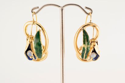null 18k yellow gold earrings featuring a blue enameled flower inside, the pistil...