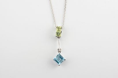 null Pendant and chain in 18k white gold, the pendant adorned with a blue topaz and...