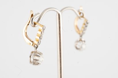 null 18k yellow and white gold sleeper earrings set with old-cut diamonds surrounded...