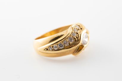 null AUGIS
Ring in 18k yellow gold centered with a brilliant-cut diamond in a moving...