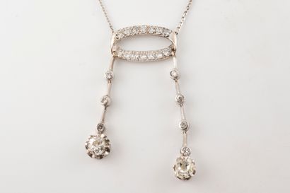 null Negligee necklace in 18k white gold consisting of a diamond-set ring holding...