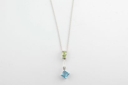 null Pendant and chain in 18k white gold, the pendant adorned with a blue topaz and...