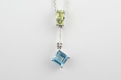 null Pendant and chain in 18k white gold, the pendant adorned with a blue topaz and...