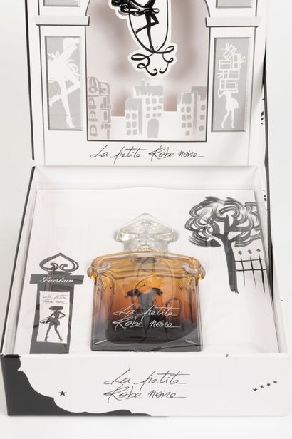null GUERLAIN "La petite robe noire", theater limited edition box set. 
Glass bottle,...