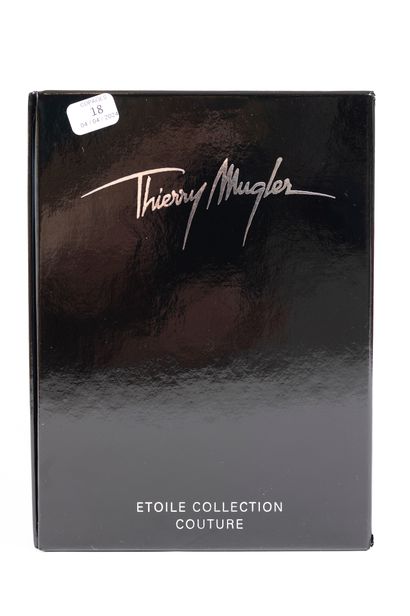 null THIERRY MUGLER « Etoile collection couture »
Flacon en cristal, découpe figurant...