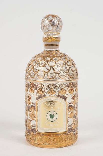 null GUERLAIN "Eau de Cologne impériale".
Glass bottle, golden bees model, titled...