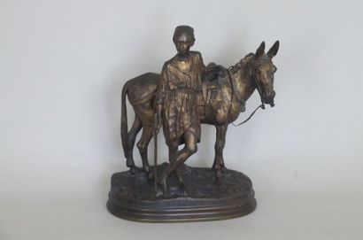 null DUBUCAND Alfred 1828-1894 Jeune homme et âne- Bronze à patine dorée- Signée...