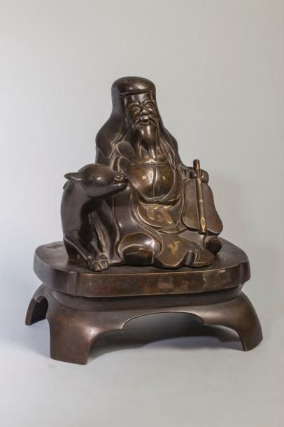Arts d'Asie Figuration d'un sage taoïste assis près de son animal support la biche,...