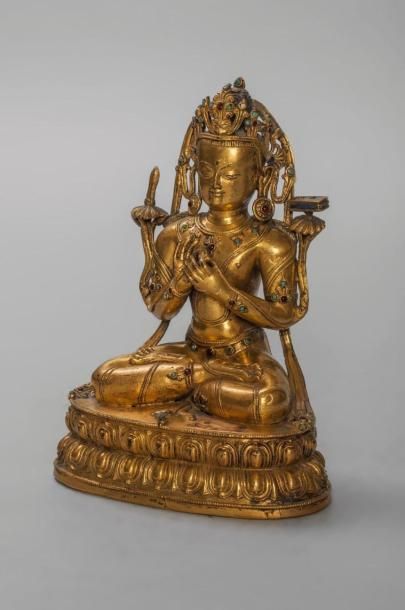 null Padmapani Lokeshvara le seigneur suprême assis en méditation sur une base à...