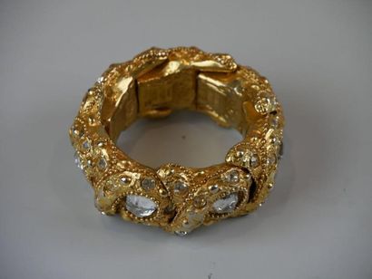 null Alexis LA00791C .Bracelet articulé monté sur élastique en résine dorée ornée...