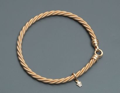null WELLENDORFF, Bracelet " Câble " en or jaune, 750 MM, portant un petit motif...