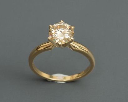 null Bague solitaire en or jaune , 750 MM, ornée d'un - diamant jaune - taille brillant...