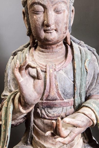 null Le Boddhisattva Kwan Yin assis en délassement les deux mains prêchant la doctrine,...