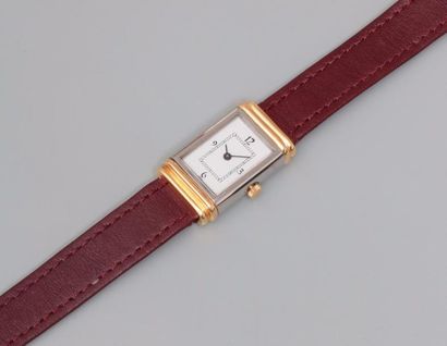 null Yves St LAURENT, Bracelet montre de dame en acier et or jaune, 750 MM, lunette...